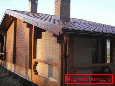 Цегляна кладка захищає брус від перегріву поблизу відкритого вогню. Цегляна кладка захищає брус від перегріву поблизу відкритого вогню.
